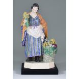 A Charles Vyse Pottery Figure - "The Daffodil Woman", circa 1925, modelled as a standing woman