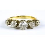 A Five Stone Diamond Ring, 20th Century, 18ct gold set with five graduated brilliant cut white