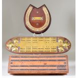 A Walnut Rectangular Cribbage Board and Other Cribbage Boards, the walnut board of moulded form