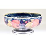 A Tudric Moorcroft Pottery Circular Bowl decorated with pomegranate design on a mottled ground and