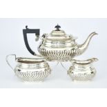 A George V Silver Rectangular Three Piece Tea Service, by Henry Matthews, Birmingham 1928, of