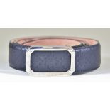 A Black Leather Belt by Gucci, embossed with company name and serial no, in cloth inner bag and