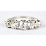 A Five Stone Diamond Ring, 20th Century, white metal, set with five old European cut diamonds,