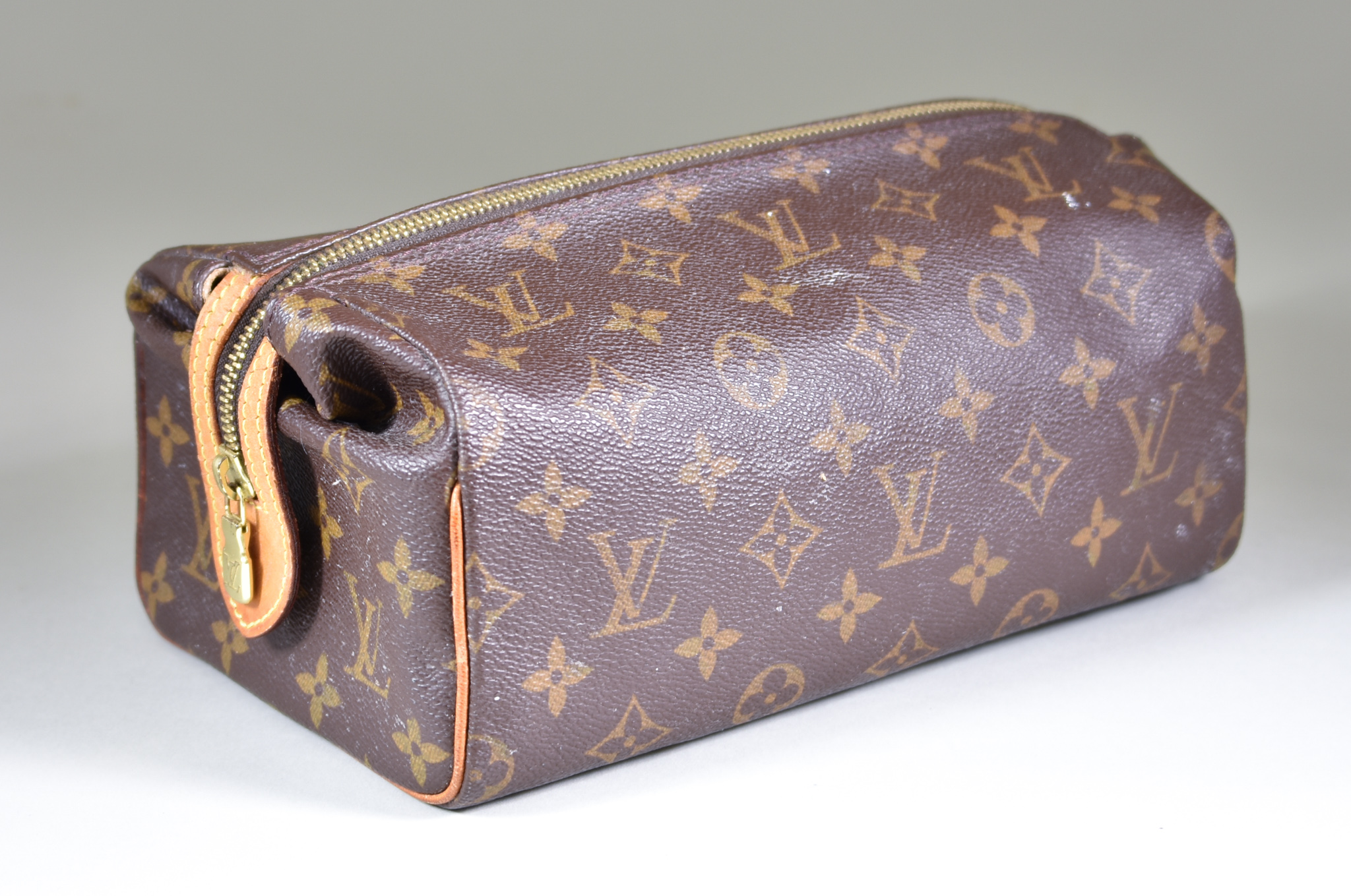 A Louis Vuitton of Paris Toilet Bag, with original receipt