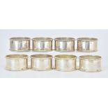 A Set of Eight Elizabeth II Silver Circular Napkin Rings by Harman Brothers, Birmingham 1983 and