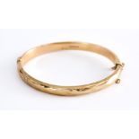 A 9ct Gold Stiff Bangle, Modern, 65mm in diameter, gross weight 10.4g