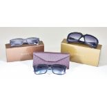 Three Pairs of Unisex Sunglasses by Gucci, in original Gucci boxes, one pair prescription, two pairs
