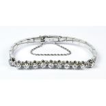 A Diamond Bracelet, 20th Century, platinum, set with eleven brilliant cut white diamonds,