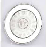 An Elizabeth II Silver Jubilee Plate, by The Danbury Mint, London, 1977, engraved with 'The Queen'