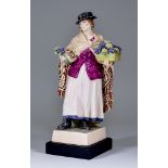 A Charles Vyse Pottery Figure -"The Shawl", circa 1926, modelled as a standing lady, a bunch of