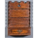 An Oak Combined Spoon Rack and Cutlery Box, Late 18th Century, the back plate with shaped top and