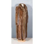 A Lady's Full Length Mink Coat with Fox Trimmings by Saga Mink, size 14