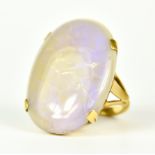 A Large Opal Ring, 20th Century, 18ct gold, set with an iridescent opal stone, 23mm x 28mm, size