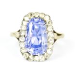 A Rare Natural Sapphire and Diamond Ring, 20th Century, yellow metal, set with a centre Sri