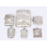 An Edward VII Silver Cigarette Case and Five Silver Vesta Cases, the cigarette case by William