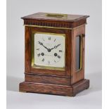 A 19th Century Rosewood Mantel Clock retailed by J.T .Bell, 151 Mount Street, Berkeley Square, the
