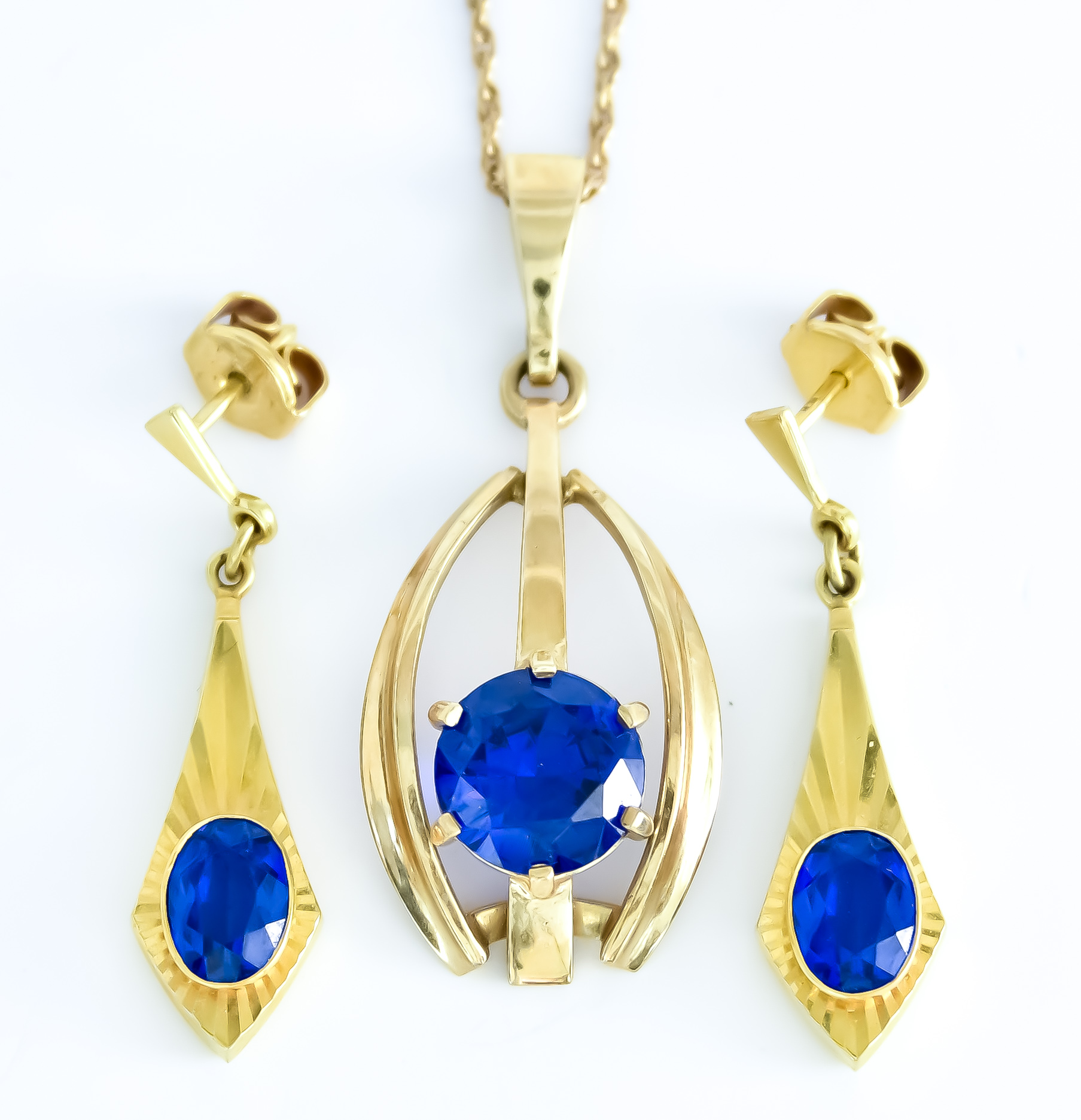 A 9ct Gold Paste Set Suite, Modern, comprising - pendant set with blue faceted stone on fine