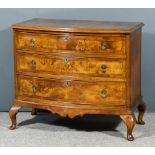 An Early 20th Century Figured Walnut Bow Front Chest, the whole inlaid with feather bandings and