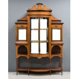 An Edwardian Mahogany Bow and Breakfront Display Cabinet, the whole inlaid with stringings,