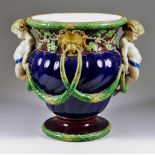 A Minton Majolica "Faun and Acorn" Jardiniere, 1866, modelled with two faun and lion masks