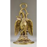 A Cast Brass Eagle and Serpent Door Stop, 13.5ins high