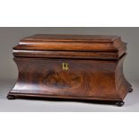An Early Victorian Figured Rosewood Tea Caddy, of sarcophagus shape, the interior fitted with cut