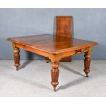 A Victorian Mahogany Extending Dining Table, with moulded edge to top, two leaves for same and on