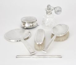 An Elizabeth II Silver Backed and Silver Mounted Six Piece Dressing Table Set, by W I Broadway &