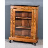 A Victorian Figured Walnut Dwarf Display Cabinet, inlaid with stringings and with gilt metal mounts,