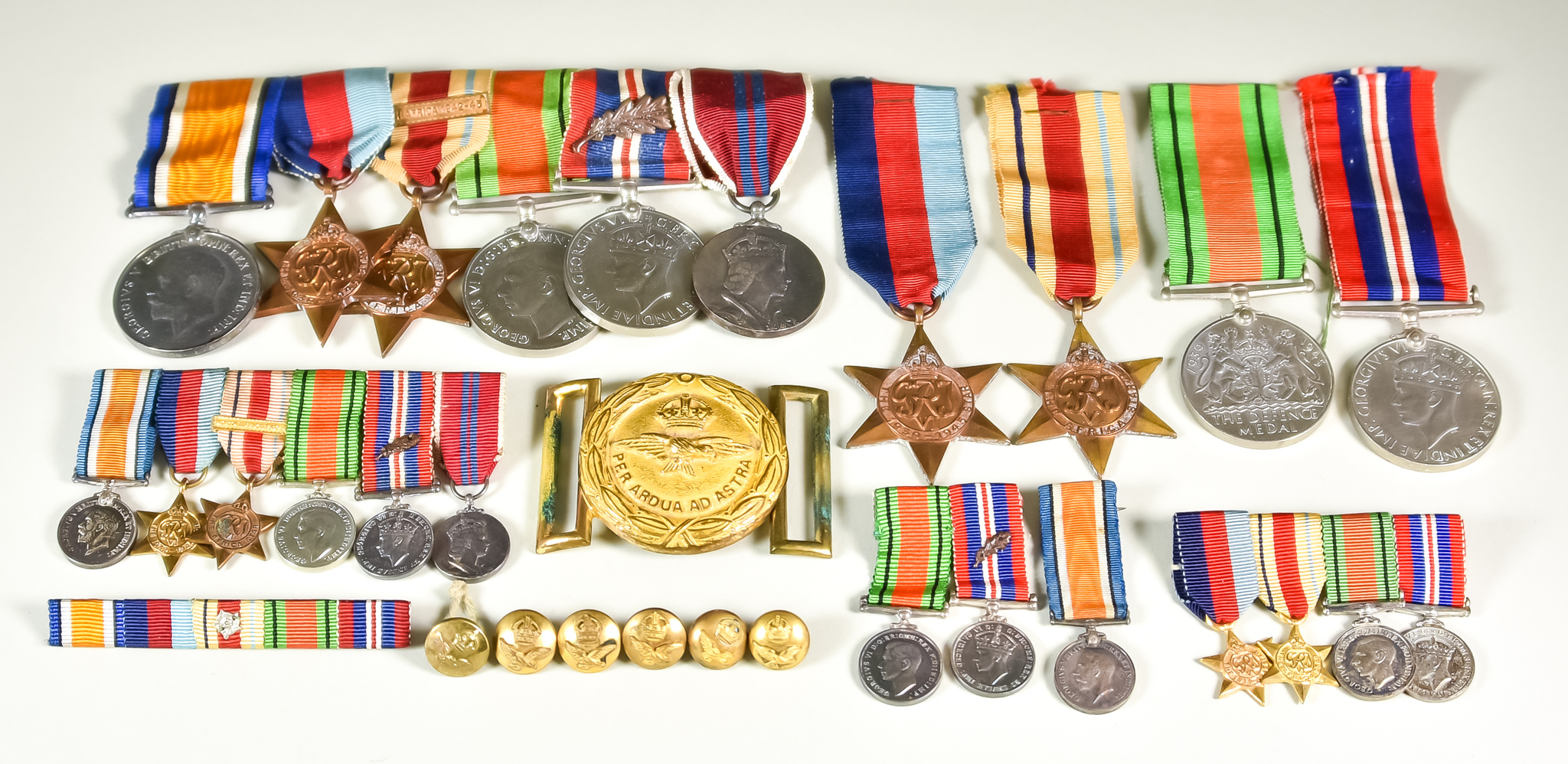 A Quantity of World War II Medals, comprising - a group of six, plus miniatures, a group of four,