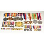A Quantity of World War II Medals, comprising - a group of six, plus miniatures, a group of four,