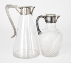 An Edward VII Silver Mounted and Clear Glass Claret Jug and a Plated Mounted and glass Claret Jug,