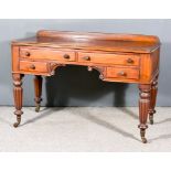 An Early Victorian Mahogany Kneehole Dressing Table in the Gillows Manner, with moulded edge to top,