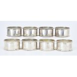 A Set of Eight Elizabeth II Silver Circular Napkin Rings by Harman Brothers, Birmingham 1983 and