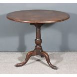 A Georgian Mahogany Circular Tripod Table, on bird cage and baluster turned column with cabriole