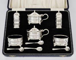 An Elizabeth II Silver Six Piece Oval Condiment Set of Neo Classical Design, by Mappin & Webb,