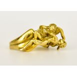 An 18ct Gold Lovers Ring, Modern, depicting a couple in a rapturous pose, size L, gross weight 12.