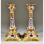 A Pair of Royal Crown Derby Bone China 1128 Old Imari Candlesticks, 10.75ins high