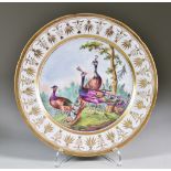 An English Porcelain Plate, Circa 1810, the well enamelled in colours with peacocks, possibly