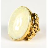 A Large Opal Dress Ring, 20th Century, 9ct gold, set with a centre opal stone 24mm x 16mm, size