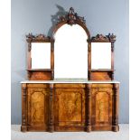 A Victorian Figured Walnut Sideboard, the whole inlaid with leaf scroll arabesques and oval fan