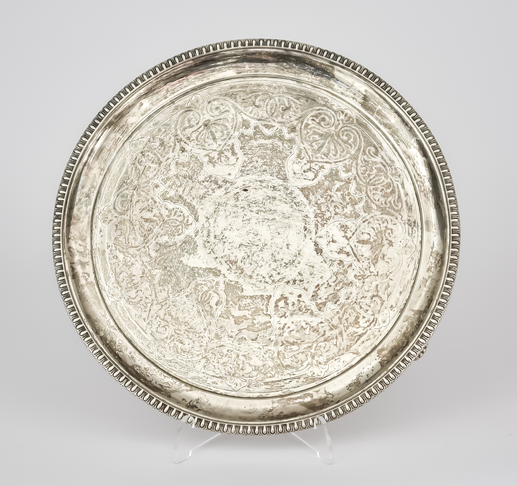 A Victorian Silver Circular Salver, by Barnard & Sons Ltd., London, 1870, with tongue mounts, the