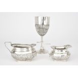A Late Victorian Silver Goblet and an Edward VII Two-Handled Sugar Basin and Milk Jug, the goblet by