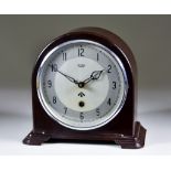 An Air Ministry Bakelite Mantel Clock by Smiths of Enfield, 6ins silver dial with black Arabic baton