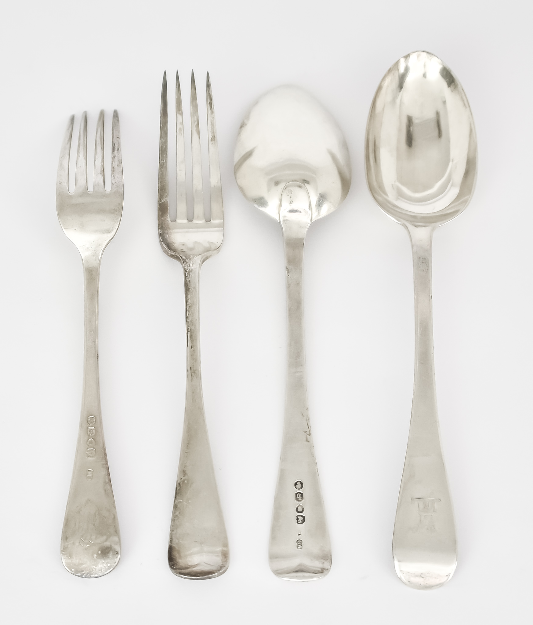 Six Victorian Silver Old English Pattern Table Spoons and Twelve Table Forks, the table spoons by