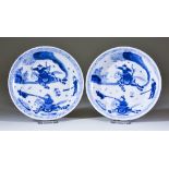 A Pair of Chinese Blue and White Porcelain Dishes, Kangxi, painted with a hunting scene, with blue