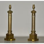 A Pair of Modern Brass Electric Table Lamps, with reeded columns on stepped square bases, 9ins high,