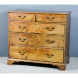 A George III Mahogany Chest, with moulded edge to top, fitted two short and three long graduated