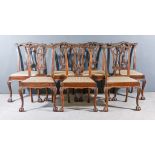 A Set of Seven Early 20th Century Mahogany Dining Chairs of Chippendale Design, with shaped and