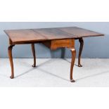 An 18th Century Mahogany Drop-leaf Cottage Dining Table, on cabriole legs with pointed feet, 39ins x